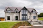 Scotframe House with stone cladding