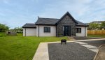 Scotframe House with stone and render